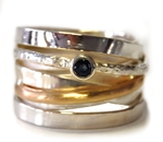 Spiralring mit Gold und Saphir. Gr.60, 319,-€